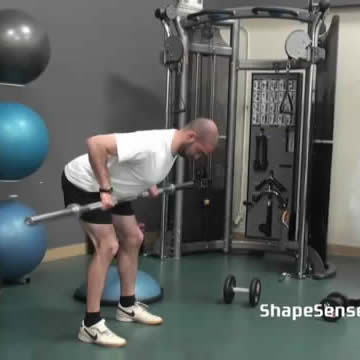 An image of a man performing the bent over barbell row exercise.