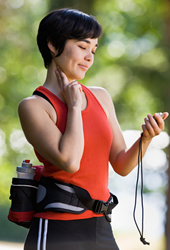 image of a woman taking her pulse